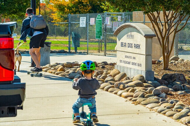 Kids love the ample paths in and around Market Side's Bear Dog Park.