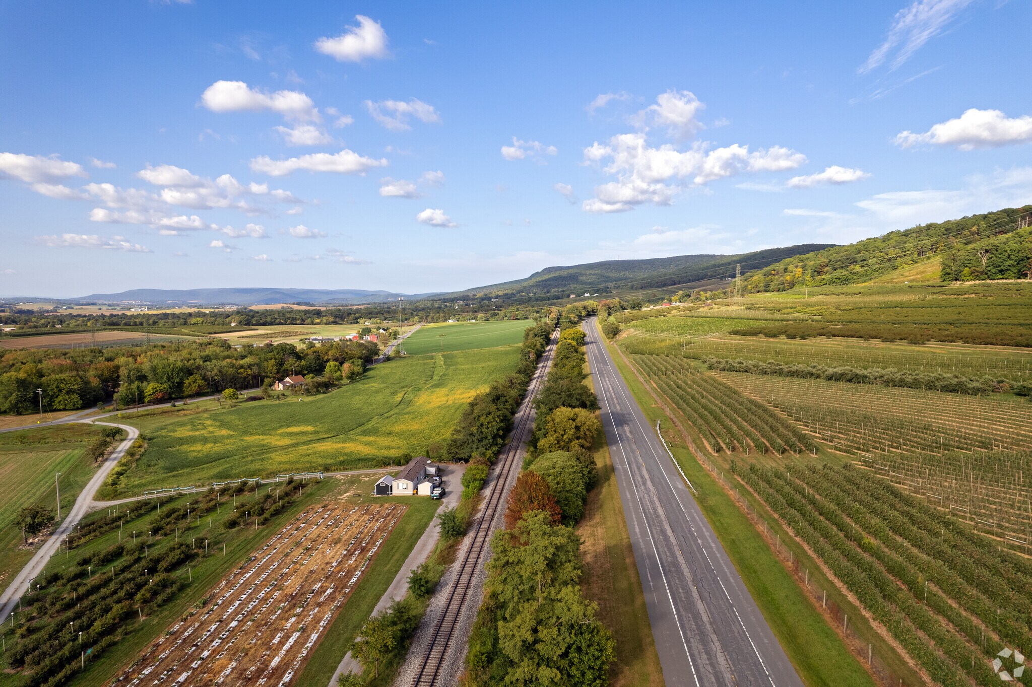 A beautiful drive up Route 419 to Ft. Ritchie offers scenic views of orchards along a mountain.