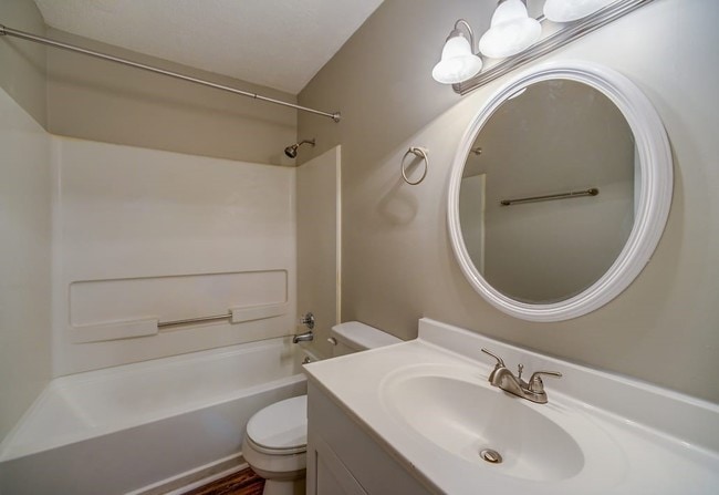 Bright, Modern Bathroom with White Cabinetry