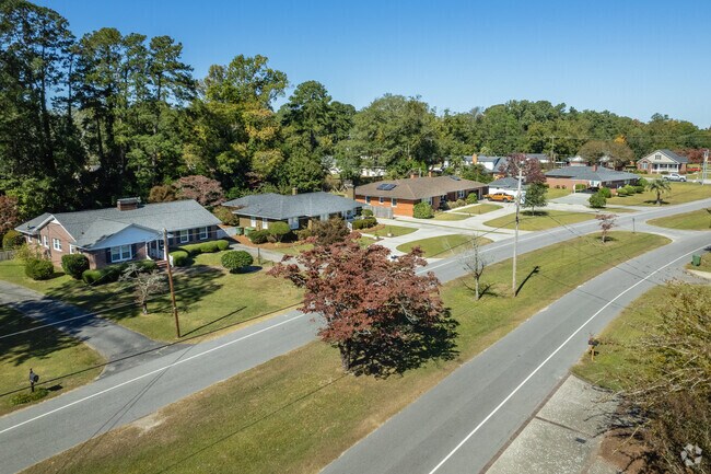 Many smaller ranch homes sit right next to major roadways.