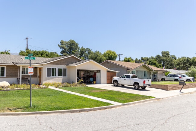 Locals take care of their yards in Mira Monte.