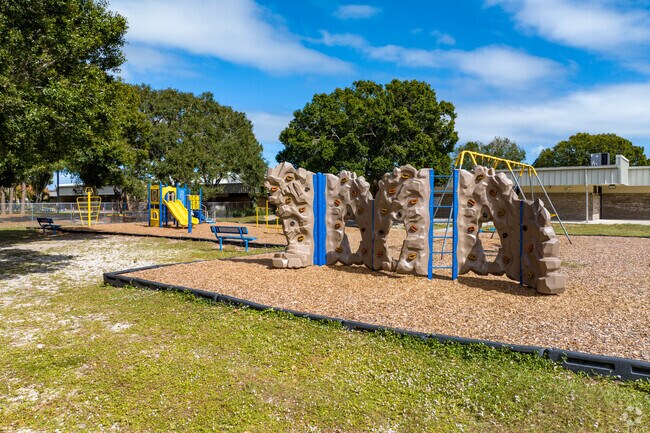 Port Malabar Elementary School's playground features a rock wall.