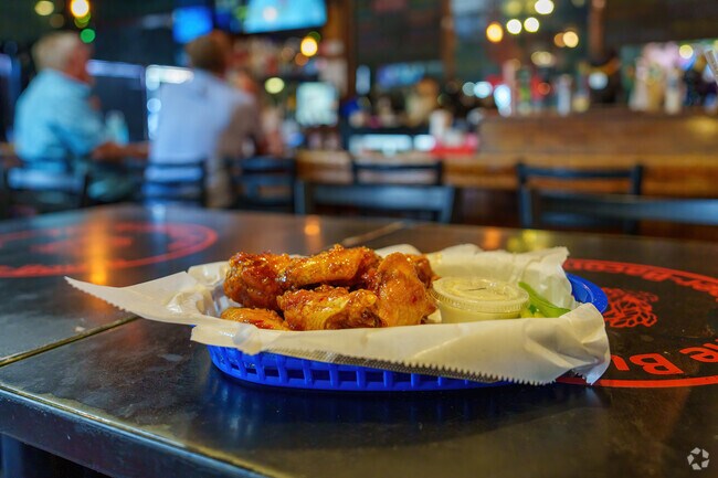 Bulldog Pub in Plantation Estates offers crispy wings as a staple.