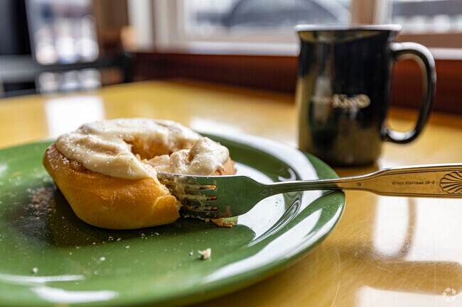 Enjoy a must-have cinnamon roll at Devoted Kiss Cafe in Gig Harbor North.