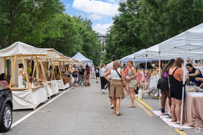 Bodacious Bloom is a flower festival in Buckhead Village with rows of vendors & activities.