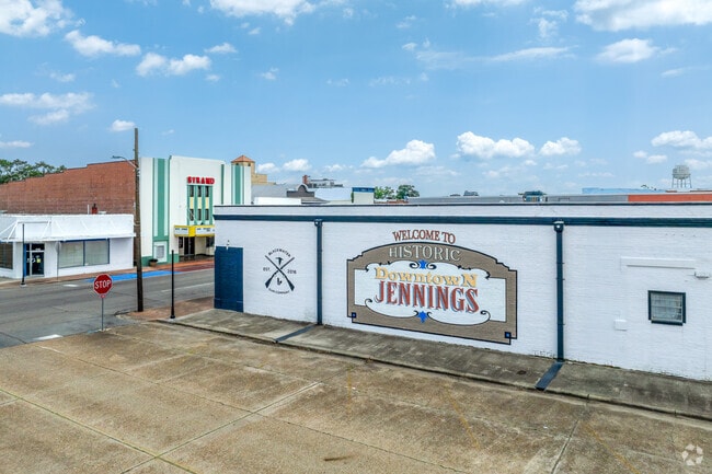Historic downtown Jennings showcases old charm with shops, cafés, and vintage signs.