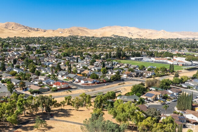 Highland Meadows features beautiful homes nestled in tranquil, green surroundings.