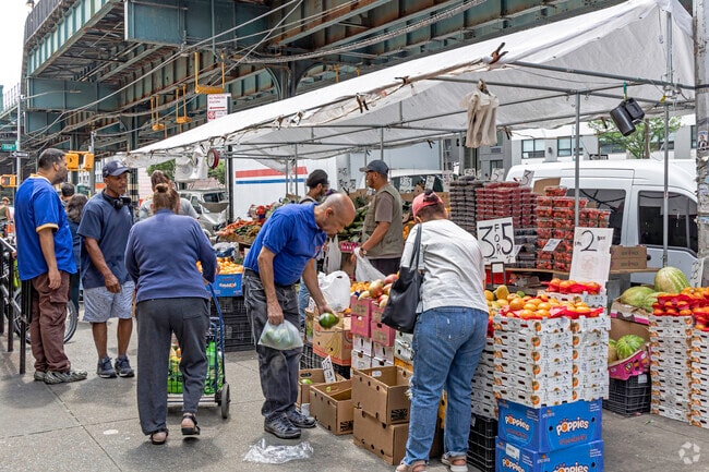 Mount Eden residents enjoying a beautiful day of shopping from the local vendors in the community.