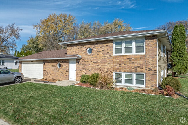Brick homes add variety to the landscape in Century Oaks.