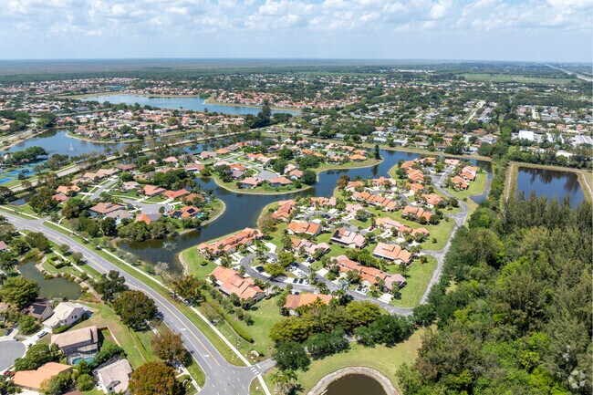 The Lakes at Boca Raton offers a great place to live surrounded by green spaces and water.