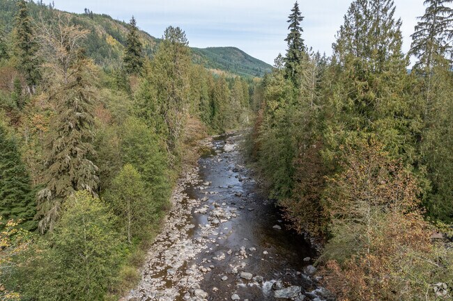 Experience the allure of Canyon Creek's vibrant community surrounded by nature.