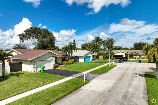 Family homes line the streets of Springtree Lakes in Sunrise, Florida.