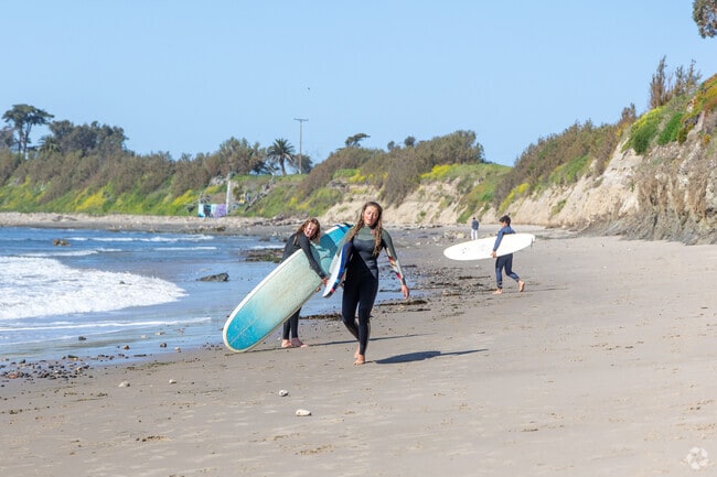 Catch some waves with friends in Isla Vista.