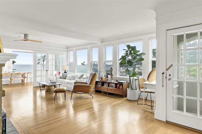 Great Room with hardwood floors, solar blinds