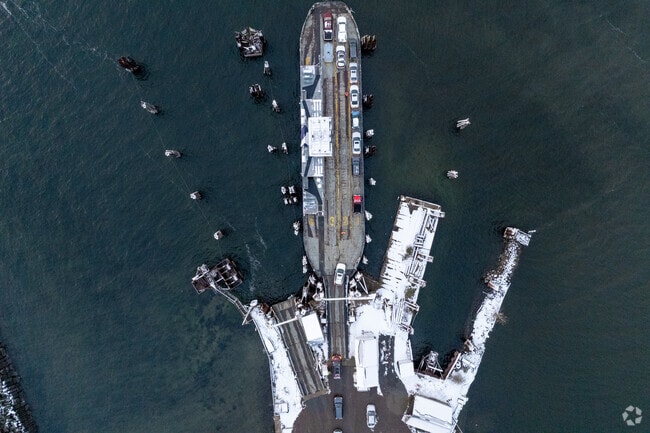 The Grand Isle Ferry departs from its port on Lake Champlain.