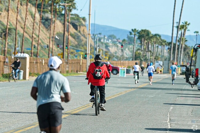 Runners and bikers enjoy the paved pathways at Doheny State Beach near Capistrano Beach.