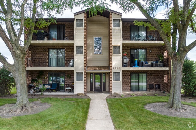 Condominium buildings have spacious balconies in McDowell Forest Preserve.