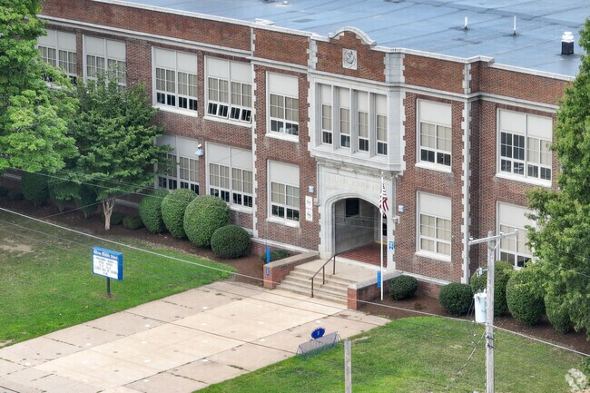 Within walking distance of neighborhood homes. Woodrow Wilson Middle School, a C-minus school, is central to Marvintown.