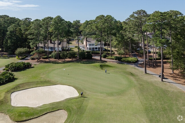 Wachesaw Plantation Club has a private 18-hole golf course with rolling fairways and greens.