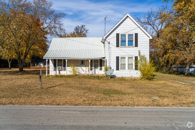 Homes are typically surrounded by trees in rural Lake Village, Indiana.