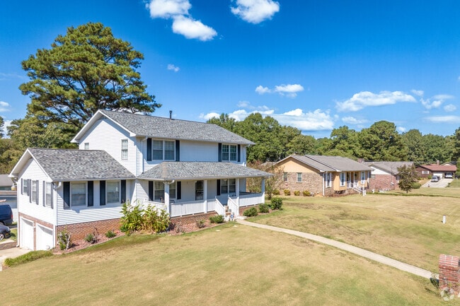 Admire the homes of many shapes and sizes in Forestdale.