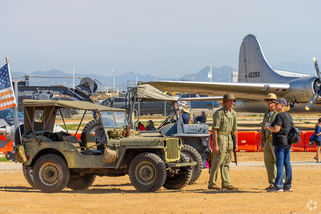 Spectators enjoy high-speed aerial action at the Annual So Cal Airshow at March Air Reserve Base near Armada