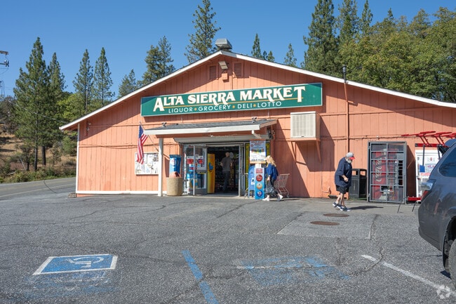 Locals shop at the Alta Sierra Market.
