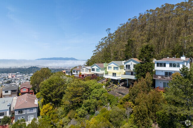 Elevated houses have amazing view of Daly City, San Francisco's Sunset District, and the fog.
