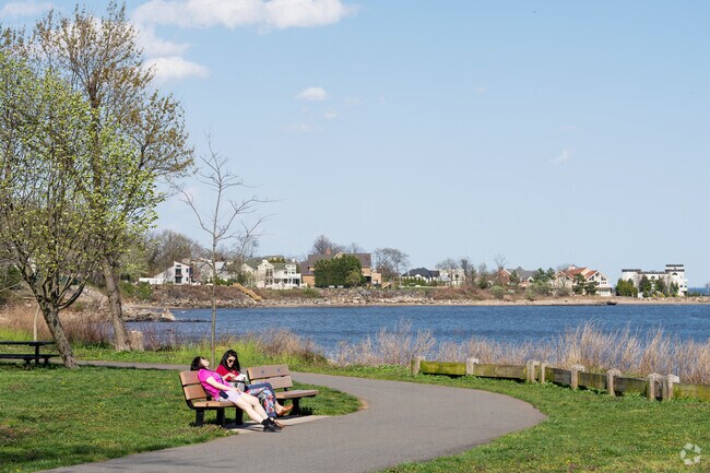 Local Wolfe's Pond Beach is a spot for Huguenot residents to walk or sit along the water.