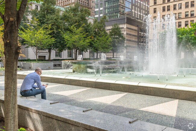 Mellon Square features beautiful water fountains providing a peaceful place for residents.