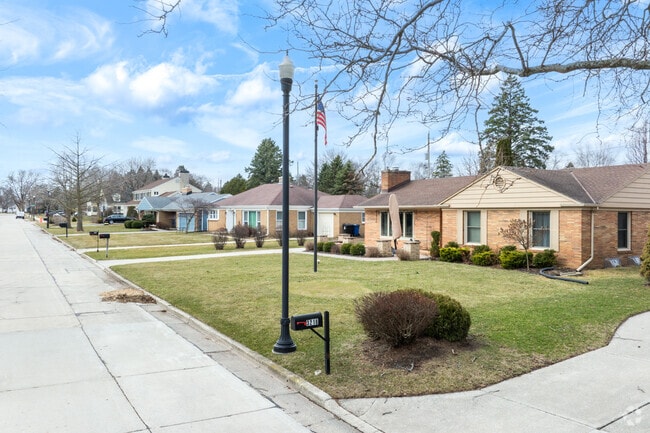 1950's ranch homes line a street in the Lakecrest neighborhood.