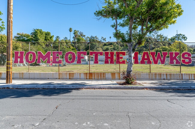 A handcrafted sign hangs at Lou Henry Hoover Elementary School in Whittier