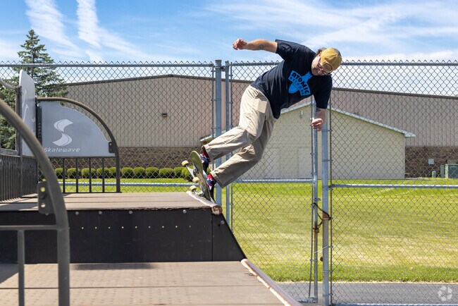 An open space skate park in Village Park features quarterpipes and boxes to grind on.