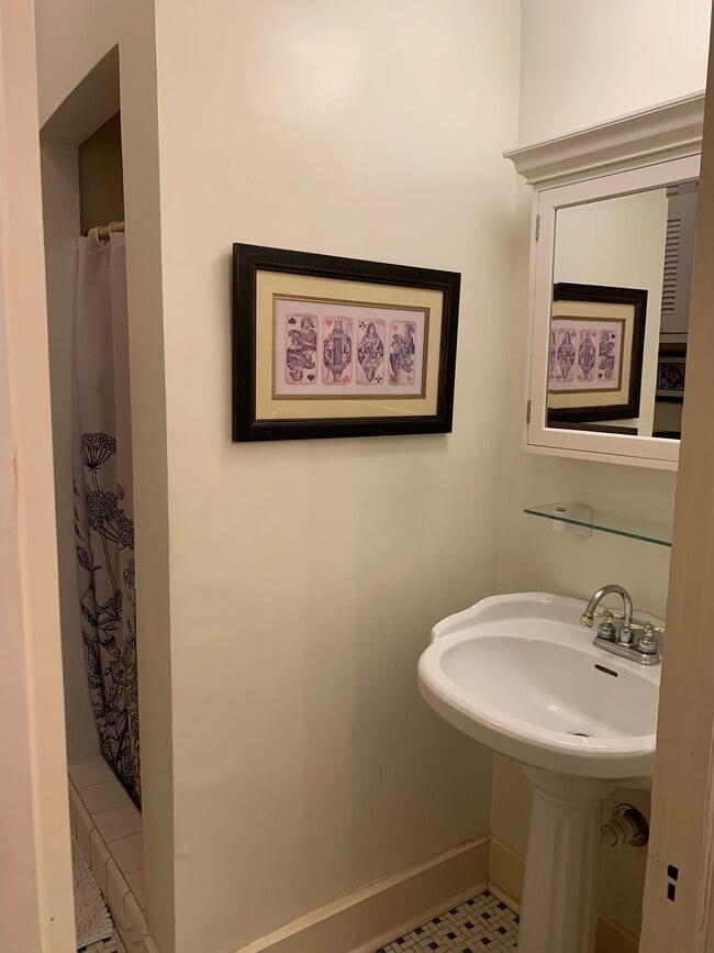 Bathroom with tiled shower