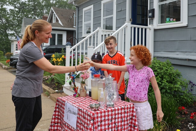On warm, sunny days, Ryal Side kids enthusiastically set up cheerful lemonade stands, adding charm and community spirit to the neighborhood streets.