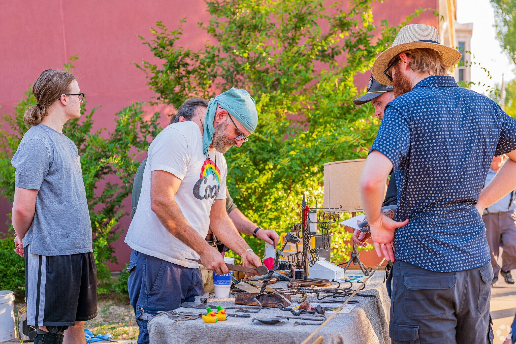 Metal goods are attractive to visitors of the 2nd Friday Norman Art Walk.
