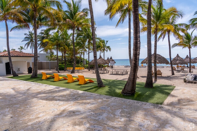 Loggia Beach Park offers umbrellas, water activities, and ocean views.