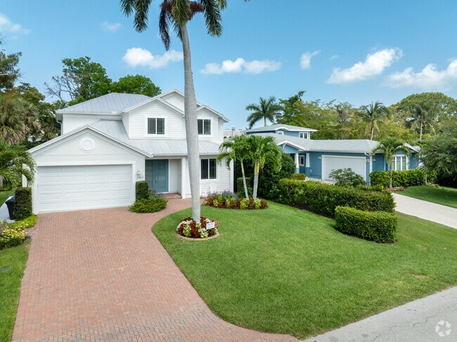 Sun Terrace homes have large landscaped yards and colorful facades.