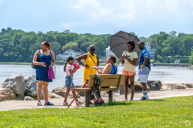 Families from Pelham Manor gather at Glen Island Park for Juneteenth celebrations.