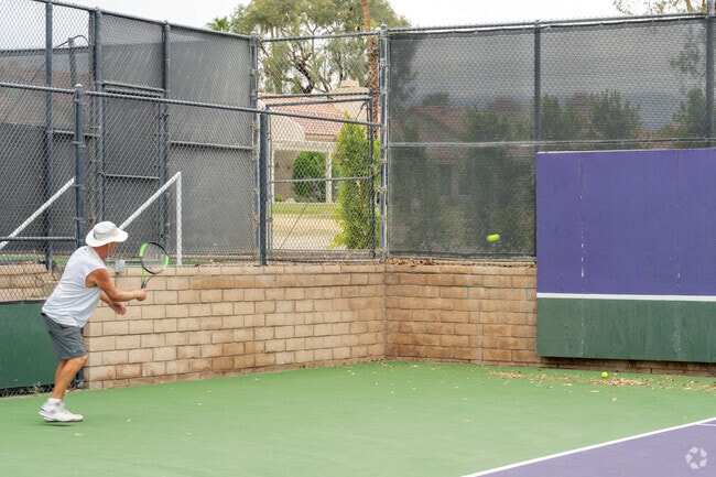 Catch a game of tennis at the Palm Valley Country Club.