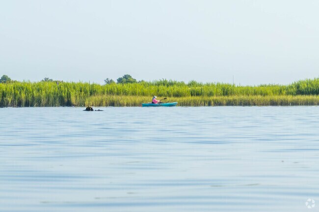 A kayaker fishes along the Calcasieu River in Graywood.