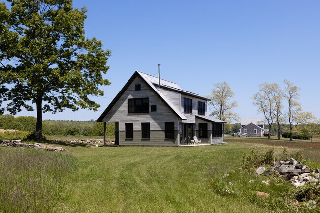 This 1787sf home overlooks the ocean in Chebeague Island.