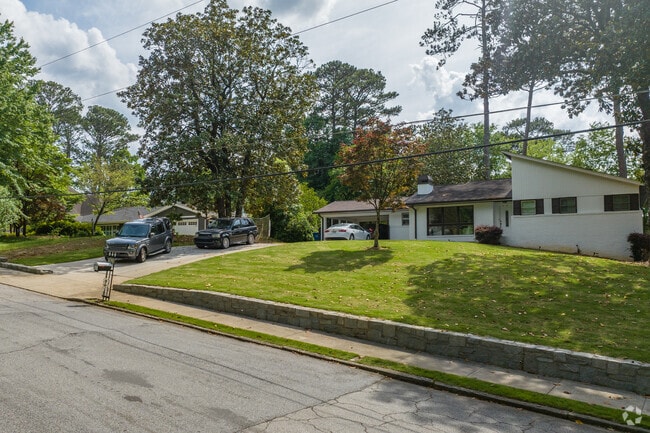 Quiet, well-kept streets lined with stately homes create a family-friendly atmosphere filled with timeless Southern appeal.