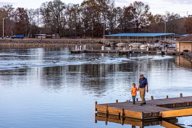 Take a walk through the park or onto the docks at Ditto Marina in Camelot.