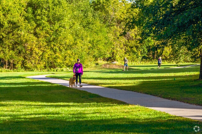 The West Papio Trail runs through Bent Creek, perfect for walking, jogging, and biking.
