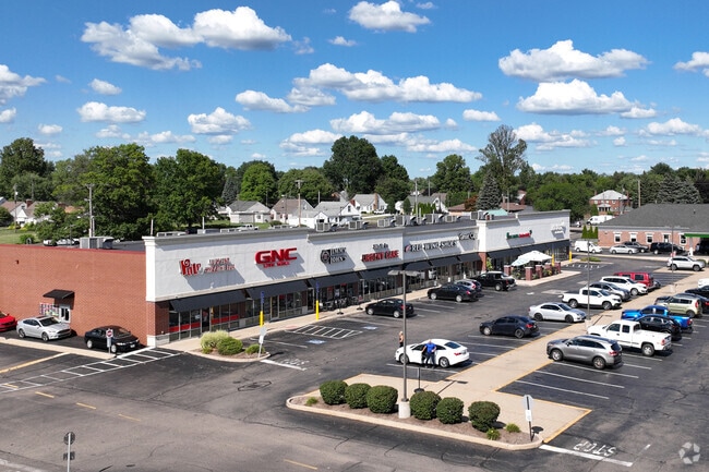 Locals run errands at the Country Fair Shopping Center in Harter Heights.