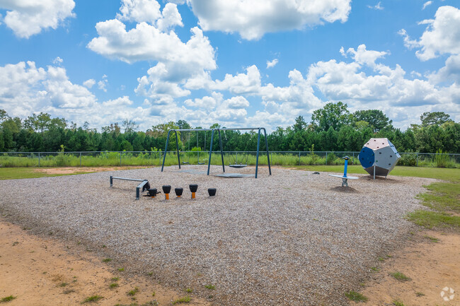 Sharon Elementary School has multiple playgrounds.