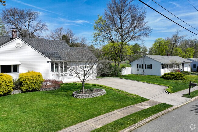 Spotswood neighborhoods feature homes with large front lawns.