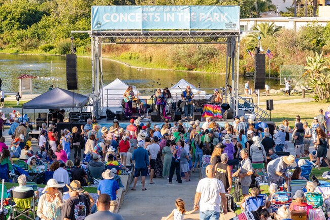 Hit the dance floor at Concerts in the Park at Polliwog Park.