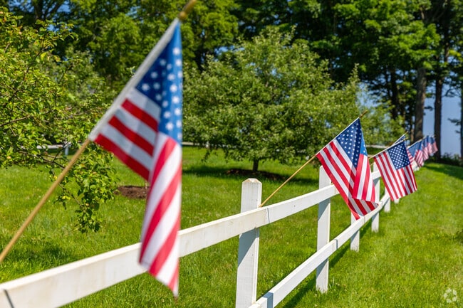 White fences and green open spaces are common throughout South Royalton's scenic village.